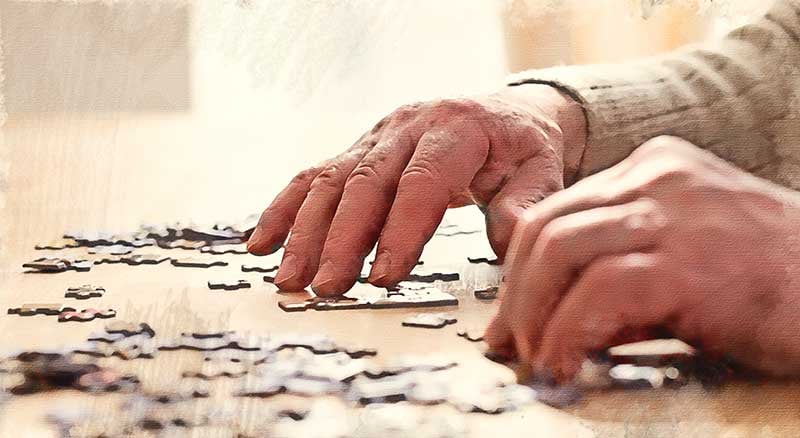 senior-male-hands-Montessori-Activities-for-Dementia-puzzle